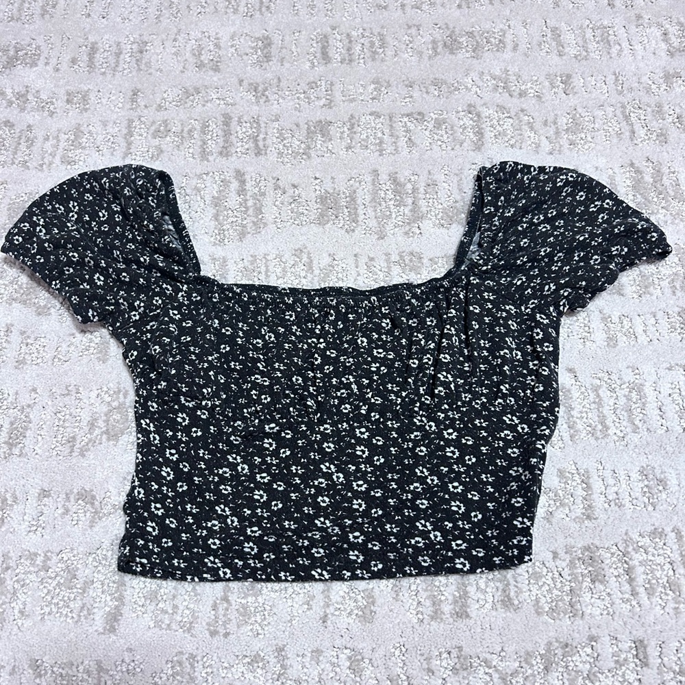 Black crop top with small white flowers
